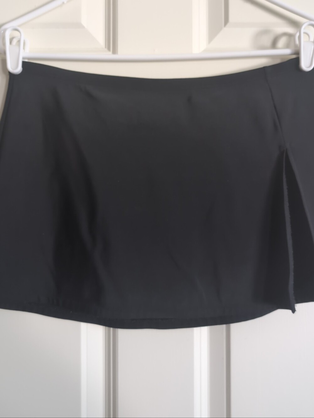 Vintage late 90s or Y2K black low rise swim mini skirt with slit